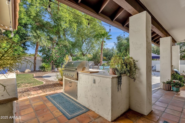 9821 E Windrose Dr, Scottsdale, AZ 85260 - fenced backyard featuring area for grilling and a patio