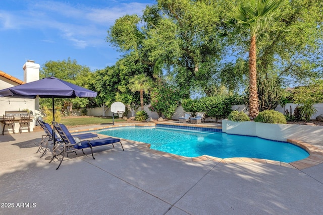 9821 E Windrose Dr, Scottsdale, AZ 85260 - view of pool with a patio and a fenced backyard