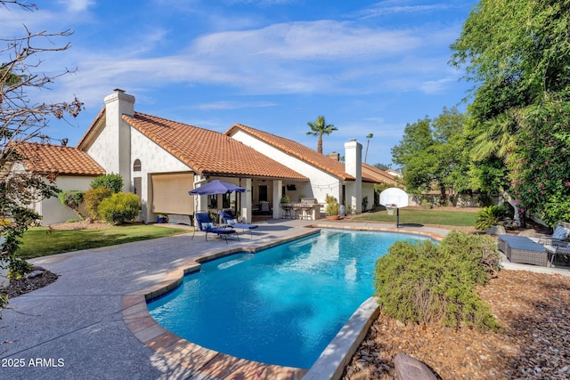 9821 E Windrose Dr, Scottsdale, AZ 85260 - view of pool featuring a patio and a lawn