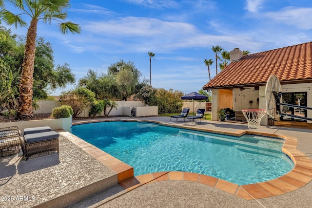 9821 E Windrose Dr, Scottsdale, AZ 85260 - view of swimming pool featuring a fenced backyard, a patio, and a ceiling fan