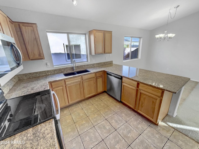 kitchen with dishwasher, sink, kitchen peninsula, pendant lighting, and a chandelier