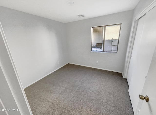 spare room with carpet