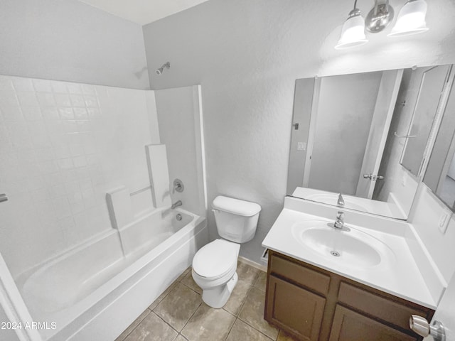 full bathroom with tile patterned flooring, vanity, toilet, and washtub / shower combination