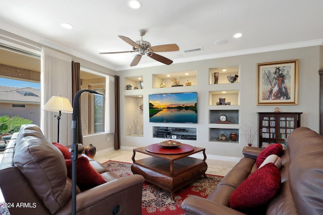 tiled living room featuring built in features, crown molding, and ceiling fan