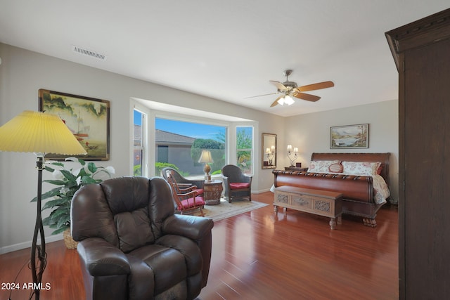 bedroom featuring ceiling fan and dark hardwood / wood-style flooring