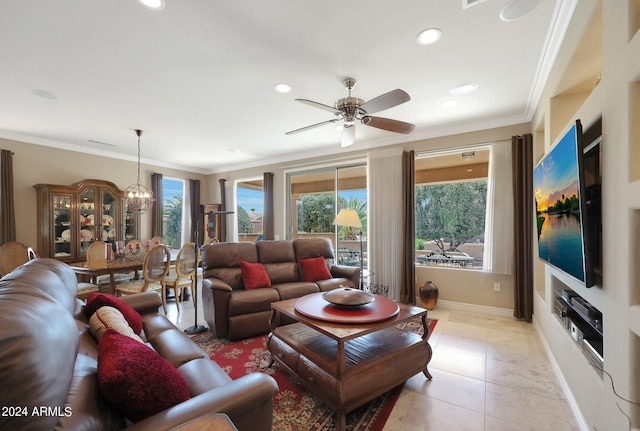 tiled living room featuring ceiling fan with notable chandelier and ornamental molding