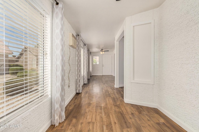 6621 S Coral Gable Dr, Chandler, AZ 85249 - corridor with baseboards, a textured wall, and wood finished floors
