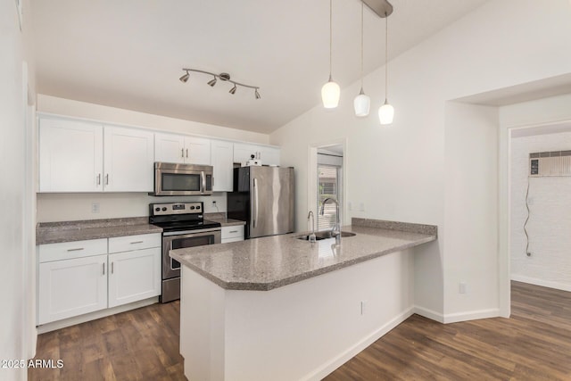 6621 S Coral Gable Dr, Chandler, AZ 85249 - kitchen featuring appliances with stainless steel finishes, a sink, a peninsula, white cabinets, and lofted ceiling