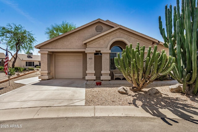 6621 S Coral Gable Dr, Chandler, AZ 85249 - view of front facade featuring stucco siding, an attached garage, and concrete driveway