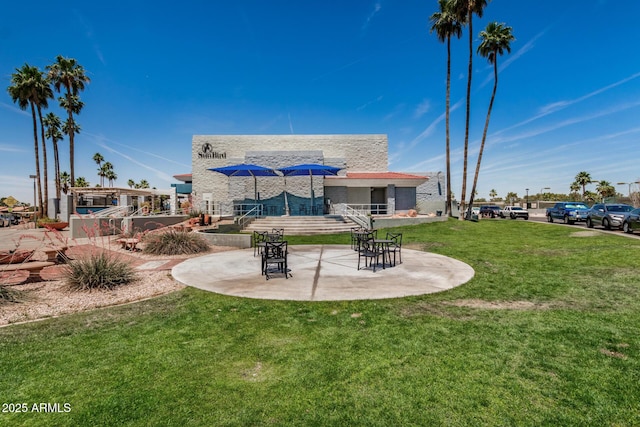 6621 S Coral Gable Dr, Chandler, AZ 85249 - view of green lawn with a patio area
