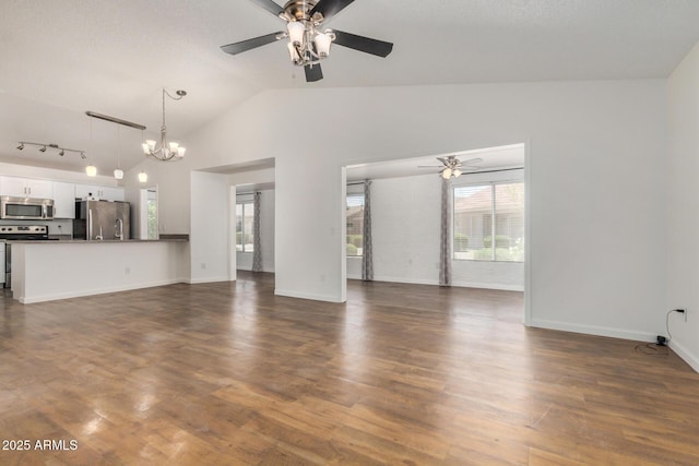 6621 S Coral Gable Dr, Chandler, AZ 85249 - unfurnished living room with ceiling fan, a chandelier, dark wood-style floors, vaulted ceiling, and baseboards