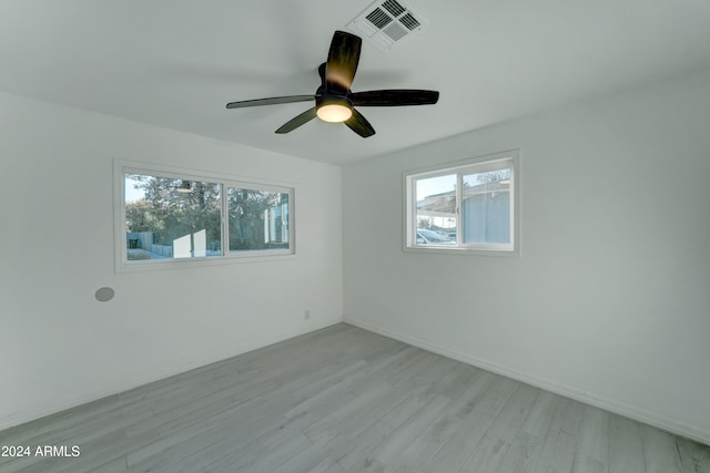 empty room featuring ceiling fan and light wood-type flooring