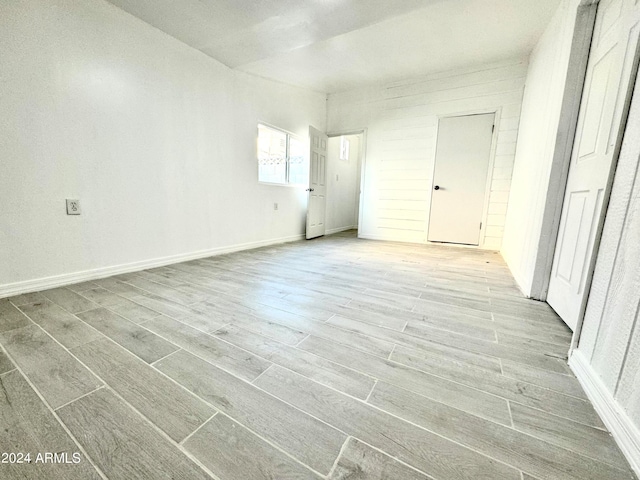 unfurnished bedroom with light hardwood / wood-style floors