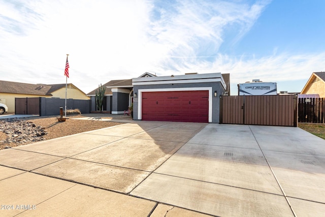 ranch-style home with a garage