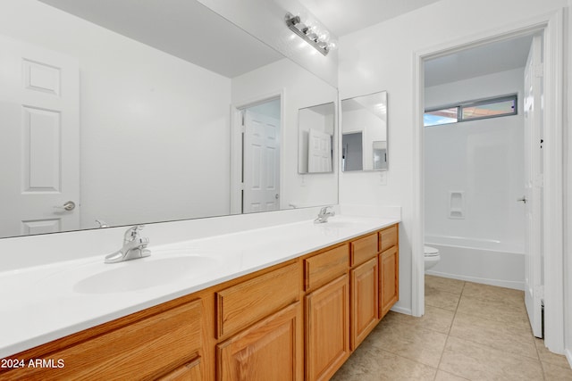 full bathroom featuring vanity, tile patterned floors, bathing tub / shower combination, and toilet