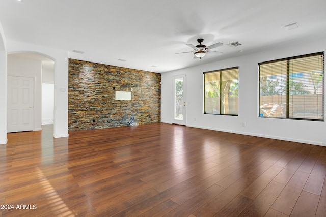 spare room with ceiling fan and hardwood / wood-style floors