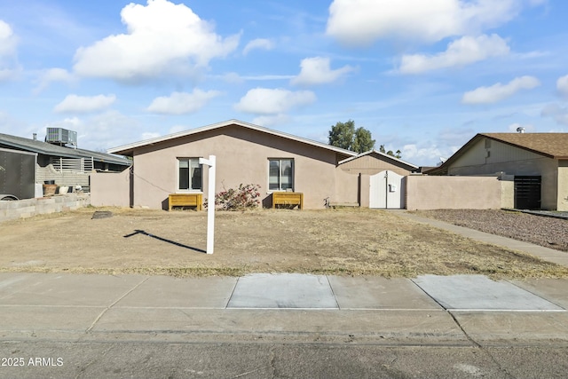 view of front of property featuring central AC unit