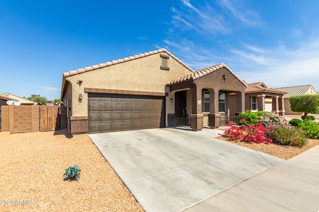 mediterranean / spanish-style house featuring a garage