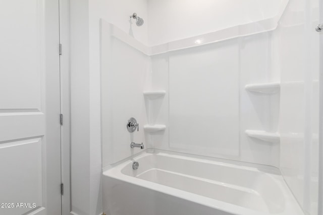 bathroom featuring washtub / shower combination