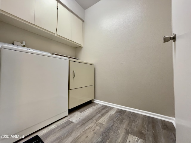 425 S Parkcrest Unit 323, Mesa, AZ 85206 - laundry area with wood finished floors and washer / dryer