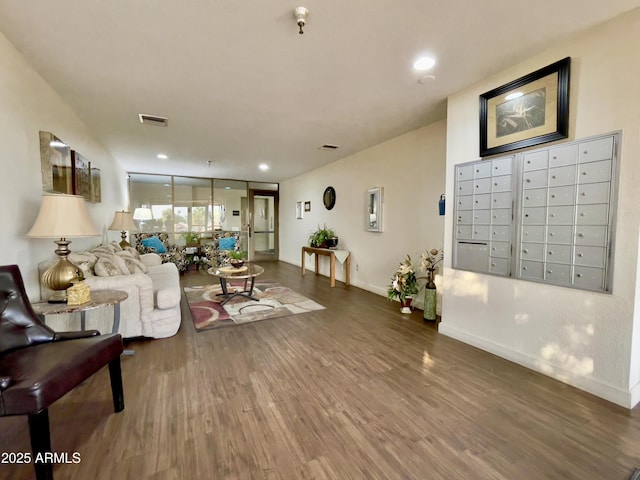 425 S Parkcrest Unit 323, Mesa, AZ 85206 - living area featuring mail area, wood finished floors, and recessed lighting