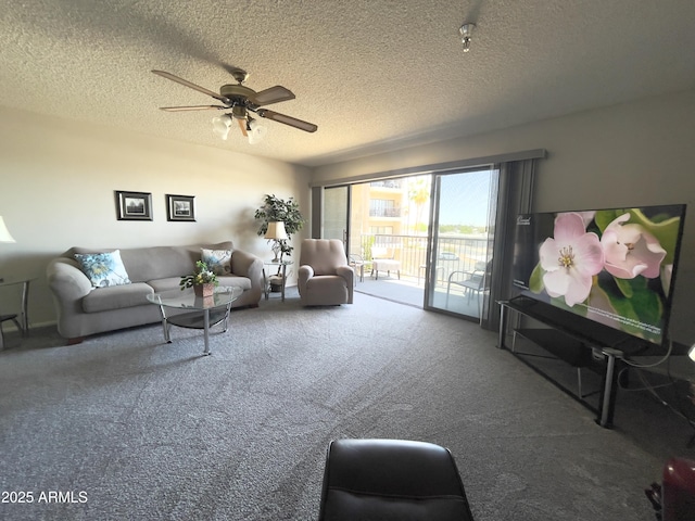 425 S Parkcrest Unit 323, Mesa, AZ 85206 - carpeted living room with a ceiling fan and a textured ceiling