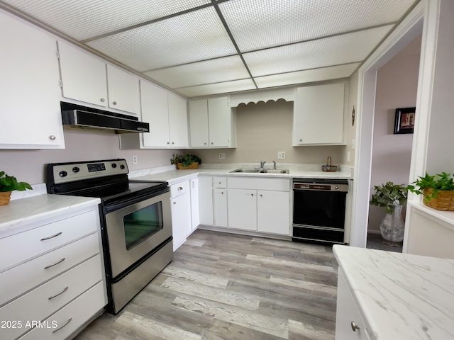 425 S Parkcrest Unit 323, Mesa, AZ 85206 - kitchen with electric range, dishwasher, under cabinet range hood, light wood-style flooring, and white cabinetry