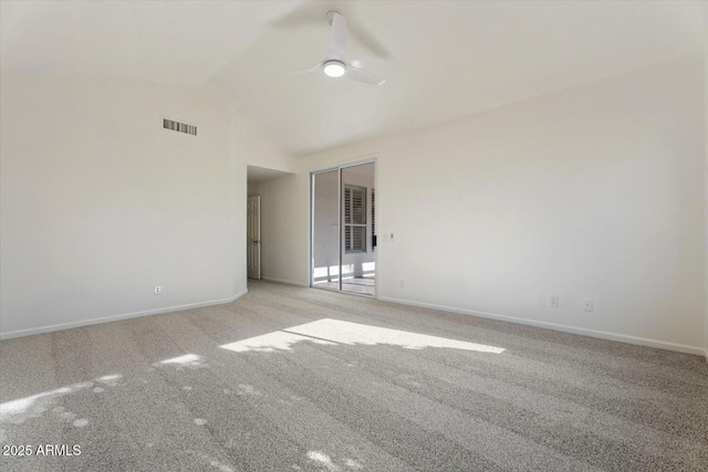 unfurnished room with ceiling fan, light colored carpet, and lofted ceiling