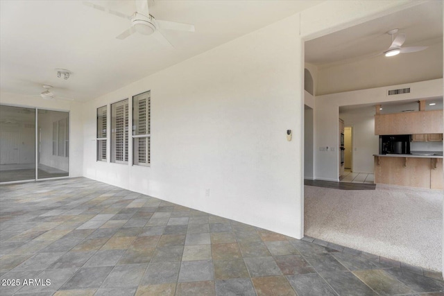 view of patio / terrace with ceiling fan