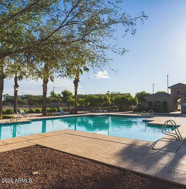 1825 E Hampton Ln Unit 108, Gilbert, AZ 85295 - community pool featuring a patio area