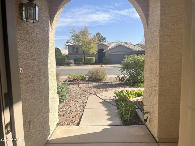 view of patio / terrace with a garage