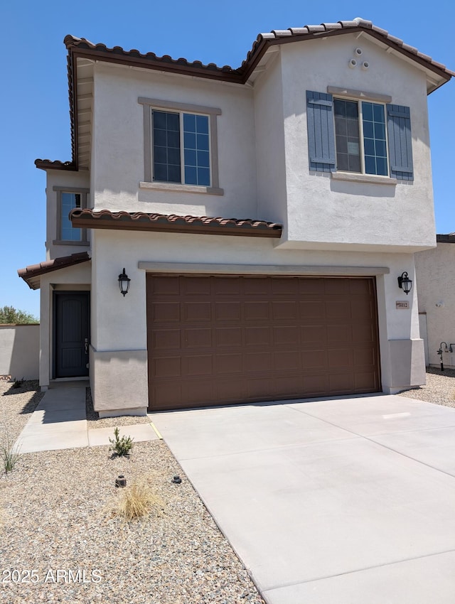 9412 E Sequence Ave, Mesa, AZ 85212 - mediterranean / spanish house with an attached garage, stucco siding, and a tiled roof