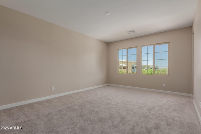 9412 E Sequence Ave, Mesa, AZ 85212 - empty room featuring light carpet and baseboards