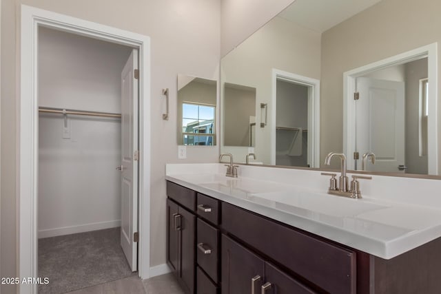 9412 E Sequence Ave, Mesa, AZ 85212 - bathroom featuring double vanity and a spacious closet