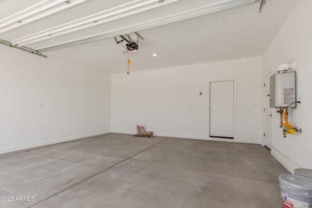 9412 E Sequence Ave, Mesa, AZ 85212 - garage featuring tankless water heater and a garage door opener