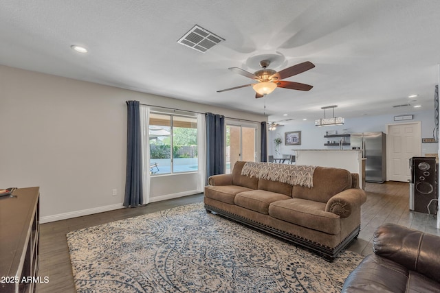 308 E Sheffield Ct, Gilbert, AZ 85296 - living area featuring a ceiling fan, dark wood-type flooring, and recessed lighting