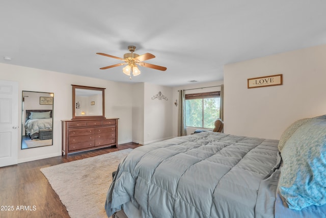 308 E Sheffield Ct, Gilbert, AZ 85296 - bedroom with dark wood finished floors and ceiling fan