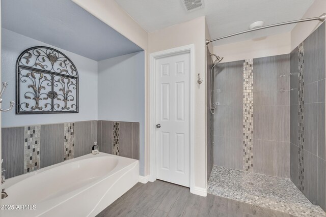 308 E Sheffield Ct, Gilbert, AZ 85296 - full bathroom with a garden tub, tiled shower, and wood finished floors