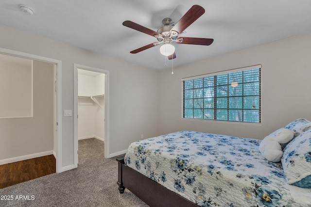 308 E Sheffield Ct, Gilbert, AZ 85296 - carpeted bedroom featuring a spacious closet, a ceiling fan, and a closet