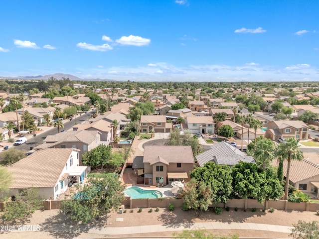 308 E Sheffield Ct, Gilbert, AZ 85296 - aerial view of residential area with a pool area and a mountainous background