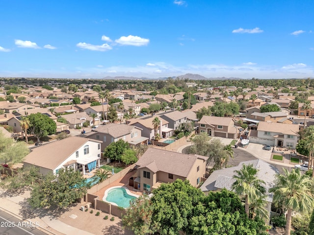 308 E Sheffield Ct, Gilbert, AZ 85296 - aerial view of residential area featuring a pool and a mountainous background
