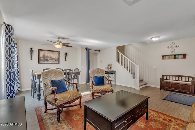 308 E Sheffield Ct, Gilbert, AZ 85296 - living room with wood finished floors, stairs, and a ceiling fan