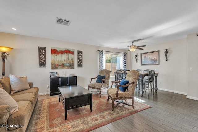 308 E Sheffield Ct, Gilbert, AZ 85296 - living area with wood finished floors, ceiling fan, and recessed lighting