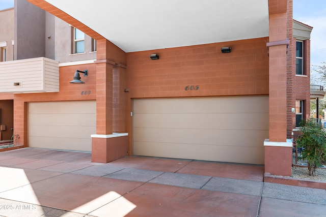 view of front of house with a garage and driveway