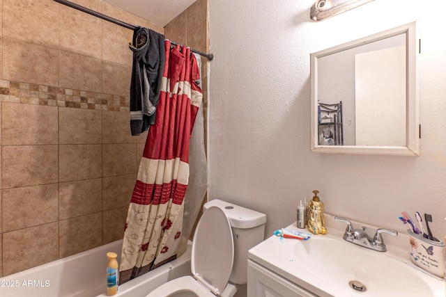 bathroom featuring toilet, a textured wall, shower / bath combo, and vanity