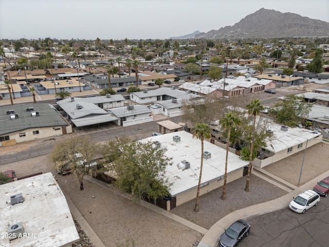 birds eye view of property featuring a residential view and a mountain view
