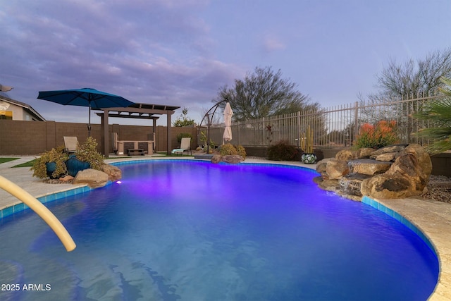 view of pool with pool water feature