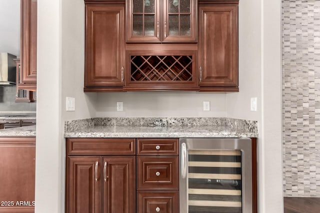 bar featuring a bar and wine cooler