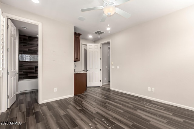 unfurnished bedroom with recessed lighting, baseboards, visible vents, and dark wood finished floors