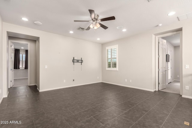 unfurnished room with visible vents, recessed lighting, baseboards, and ceiling fan